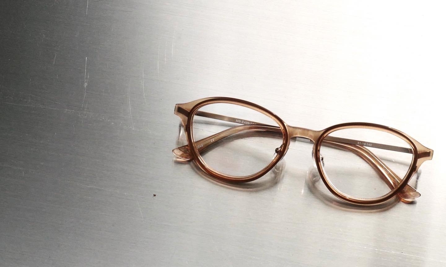 Custom OEM round optical glasses featuring brown copper acetate frames and clear lenses, manufactured by Concept Eyewear in Vietnam, China, and Asia.