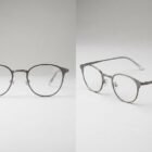Two gender‑neutral thin metal eyeglass frames side by side, front view on the left and angled side view on the right, showcasing a minimalist 2026 unisex design for global eyewear brands.
