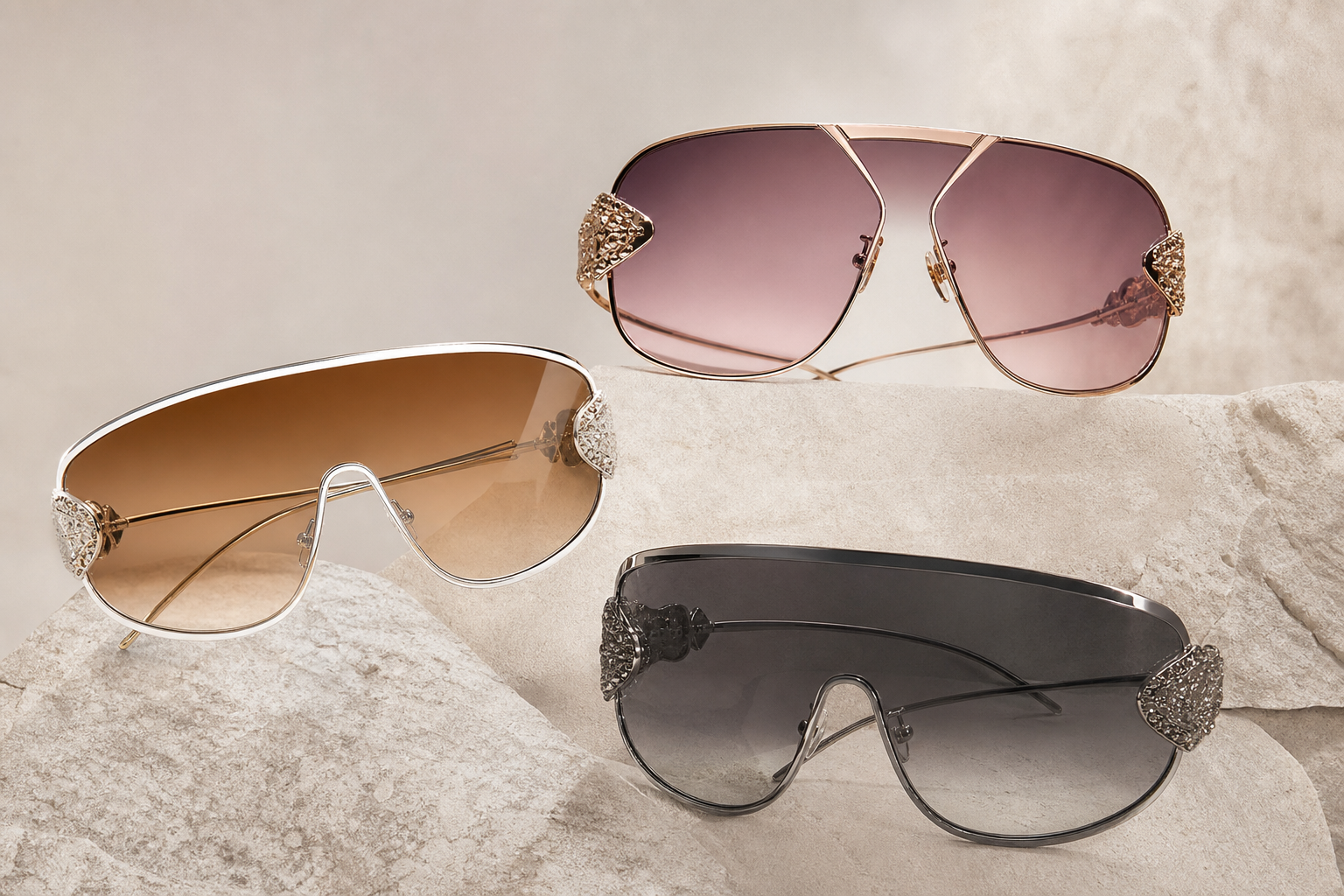 Oversized metal sunglasses in rose gold, white gold and gunmetal finishes with gradient tinted lenses on a clean minimalist background, representing the 2026 jewellery-inspired eyewear trend.